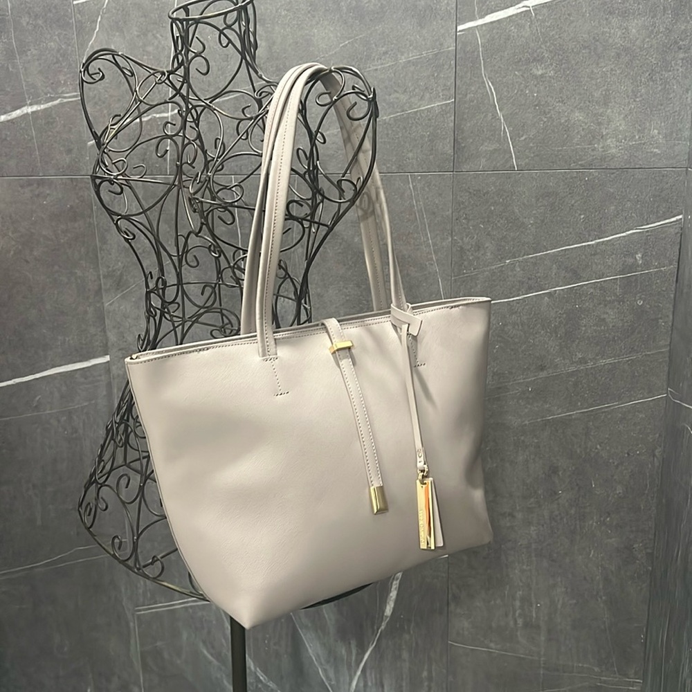 Vince Camuto NWT bag with dust bag.  Genuine leather Light beiges.  Retail $148